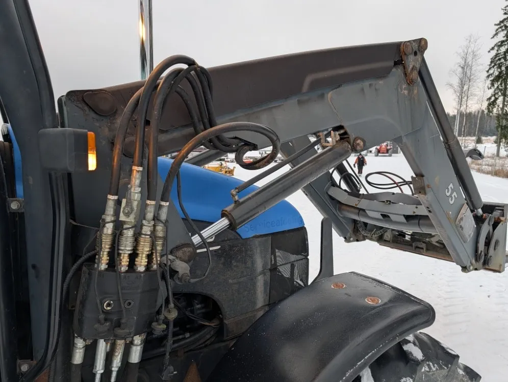 New Holland TS100 traktori / Etukuormaajalla - Katso video!