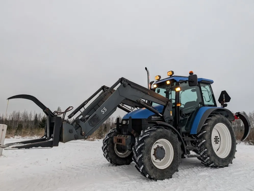 New Holland TS100 traktori / Etukuormaajalla - Katso video!