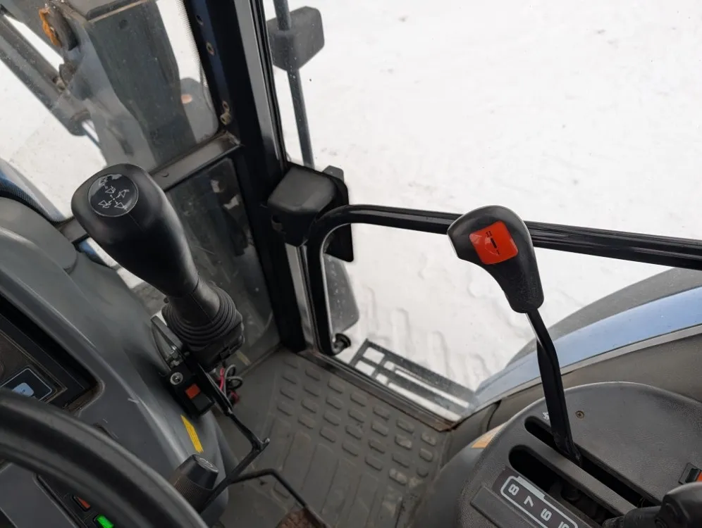 New Holland TS100 traktori / Etukuormaajalla - Katso video!