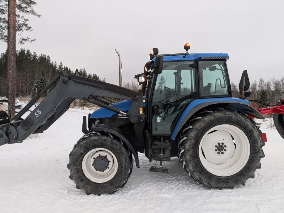 New Holland TS100 traktori / Etukuormaajalla - Katso video!