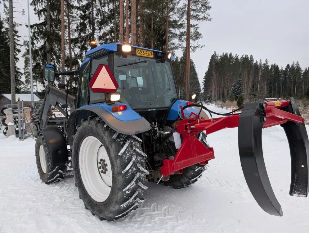 New Holland TS100 traktori / Etukuormaajalla - Katso video!