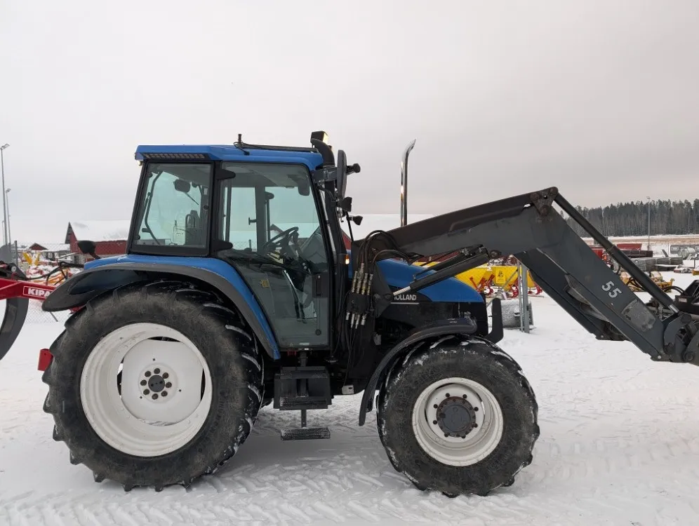 New Holland TS100 traktori / Etukuormaajalla - Katso video!