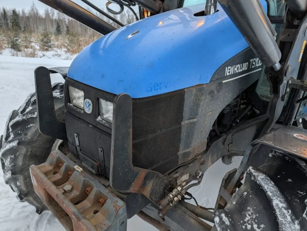 New Holland TS100 traktori / Etukuormaajalla - Katso video!