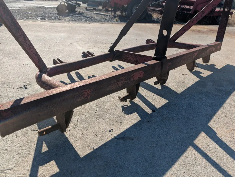 Syrjäkyntölaite traktoriin /