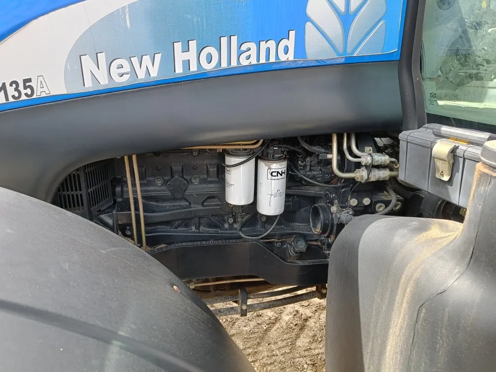 New Holland TS135A Plus traktori / Etunostolaitteella, siisti kone!